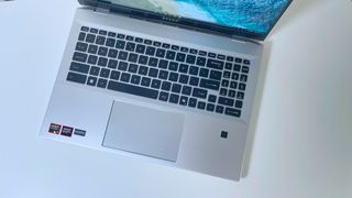 The keyboard deck on the MSI Prestige A16 AI+ seen from above on a white table