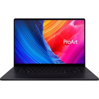 An open and powered on black laptop against a white background.