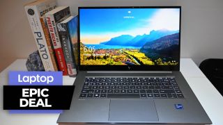 HP ZBook Studio G8 on a white table top surrounded by books